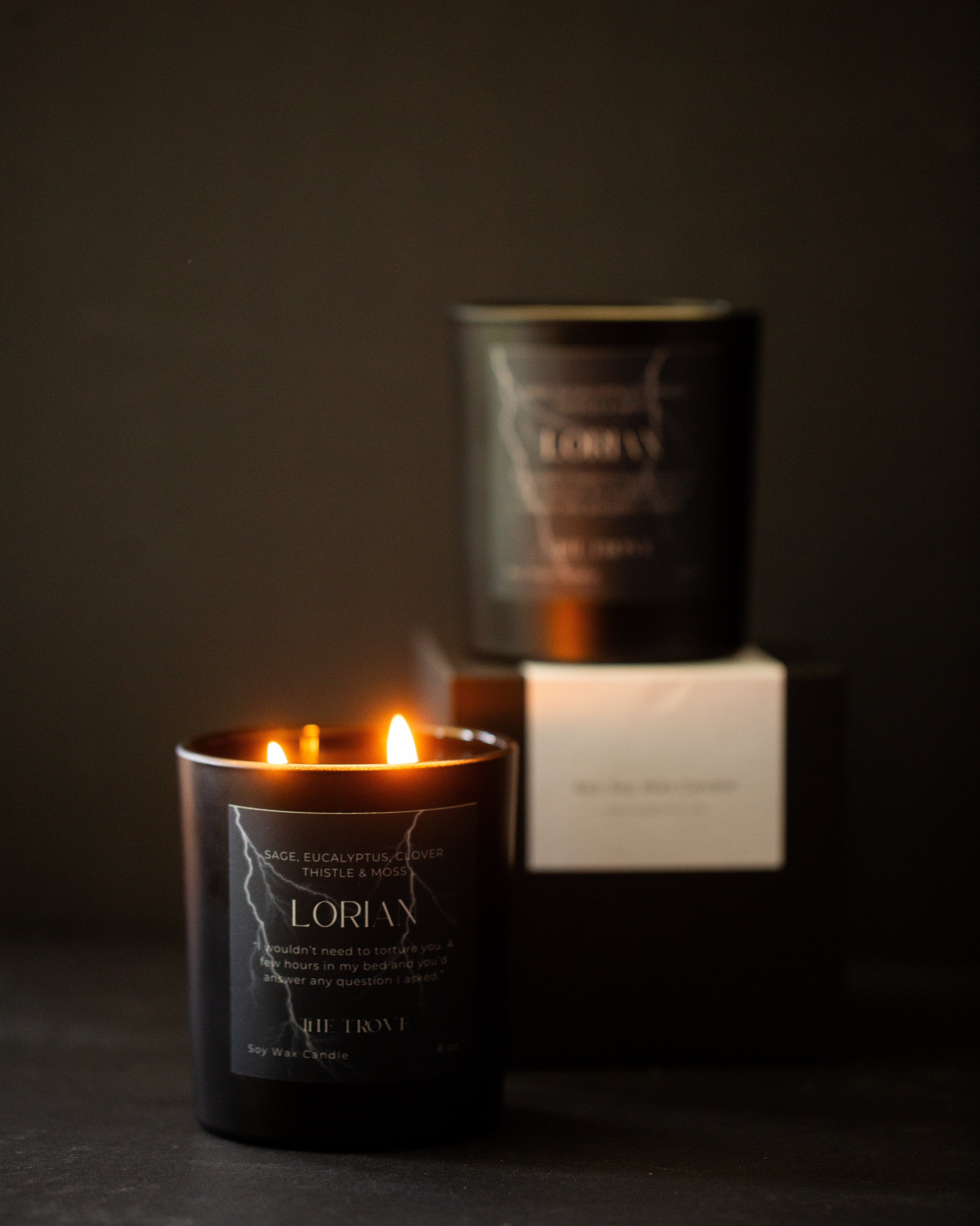 Candle with a visible label in a dark setting